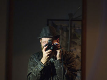 Portrait of man photographing