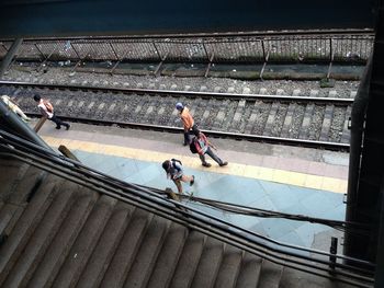 High angle view of men at railroad station