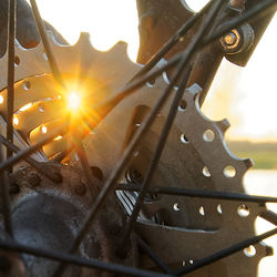 Close-up of metal against sky during sunset