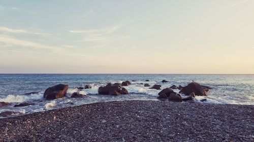 Scenic view of sea against sky during sunset