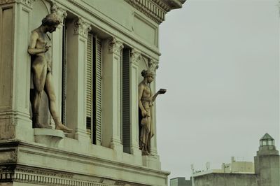 Low angle view of statue of historic building