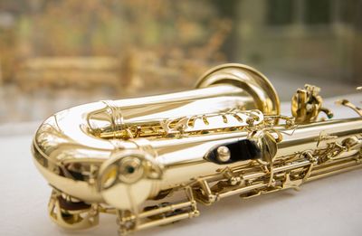 Close-up of saxophone on table