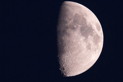 Low angle view of moon against clear sky