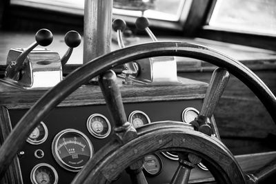 Close-up of steering wheel in boat
