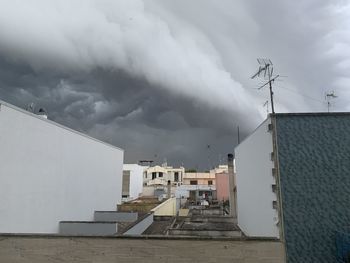 Buildings in city against sky