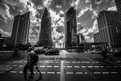 City street against cloudy sky