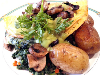 Close-up of served food in plate