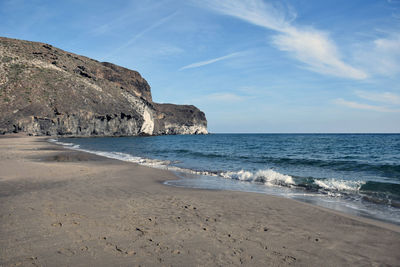 Scenic view of beach against sky