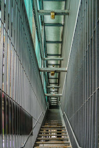 Staircase in illuminated corridor