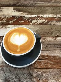 Close-up of cappuccino on table