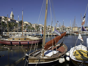 Boats moored in harbor