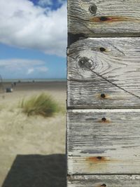 Close-up of wood against sky