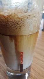 Close-up of coffee in glass on table