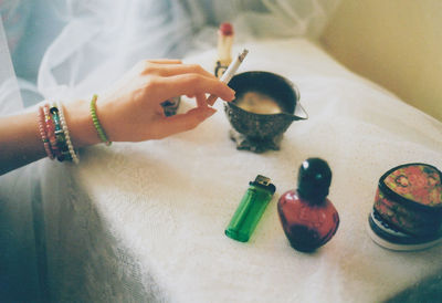 Close-up of hand holding ice cream