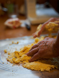 Close-up of person preparing food