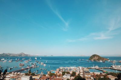 Panoramic view of sea and buildings against sky