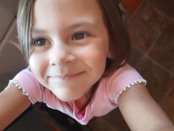 Close-up portrait of a smiling girl