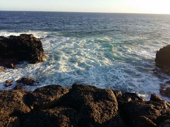 Scenic view of sea against clear sky