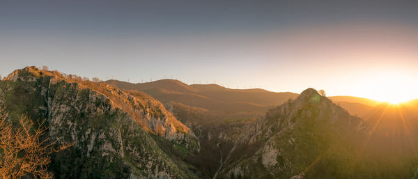 Scenic view of mountains against sky during sunset