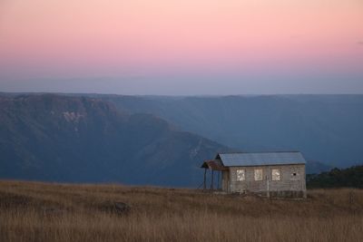 Scenic view of landscape against sky during sunset