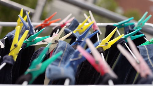 Colorful clips and laundry hanging on clothing line