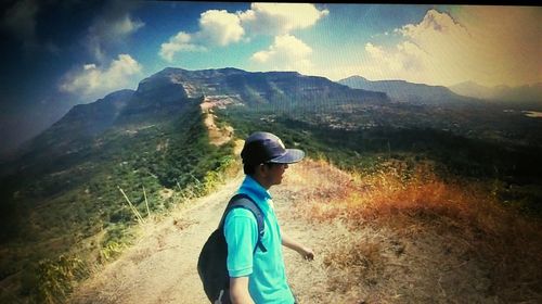 Man standing on mountain landscape