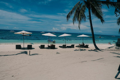 Scenic view of beach against sky