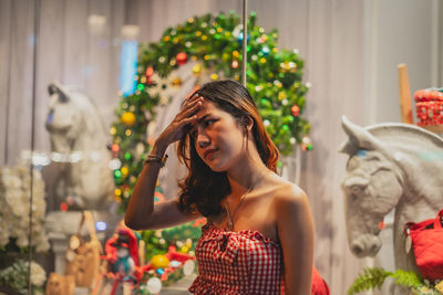 Young woman looking away outdoors