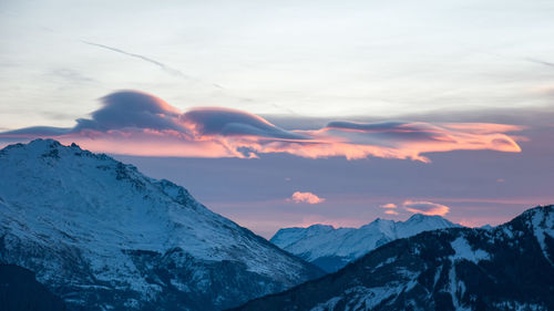 Idyllic shot of snowcapped mountains against sky