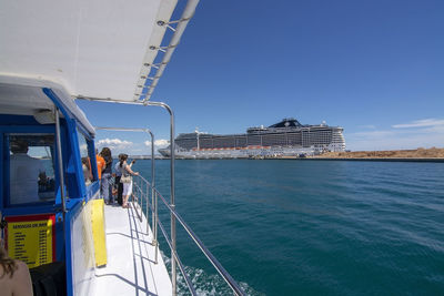 Panoramic view of sea against clear blue sky