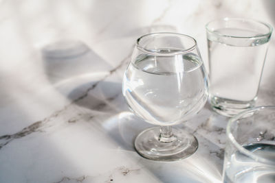 Close-up of wineglass on table