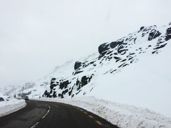 Scenic view of mountain road against sky