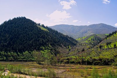 Scenic view of mountains against sky