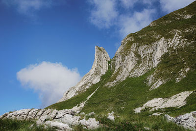 Low angle view of rocks against sky