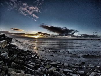 Scenic view of sea at sunset