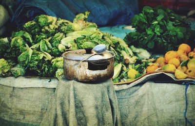 Cooking utensil against chinese cabbages at market