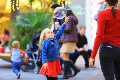 Children playing with bubbles