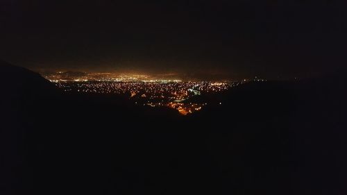 View of illuminated city at night