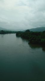 Scenic view of river against sky