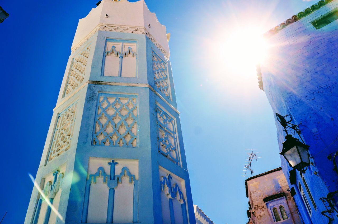 LOW ANGLE VIEW OF CHURCH AGAINST BLUE SKY