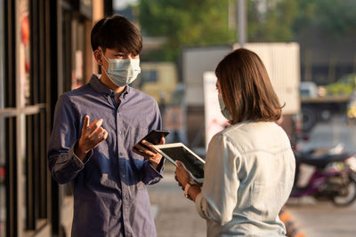 Young man using mobile phone