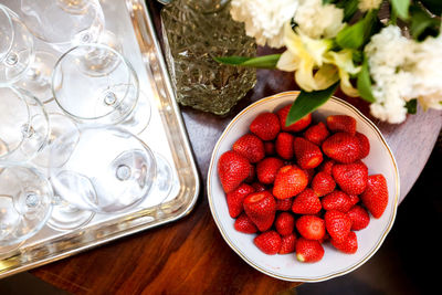 High angle view of strawberries on table