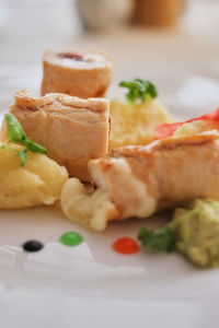 Close-up of served food in plate