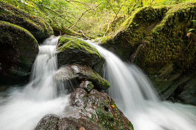 Long exposure of a waterfall on the hoar oak water river flowing through the woods at watersmeet 