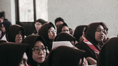 Group of people looking at camera