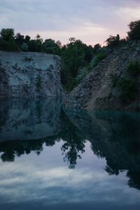 Scenic view of lake against sky during sunset