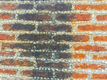 Full frame shot of multi colored brick wall