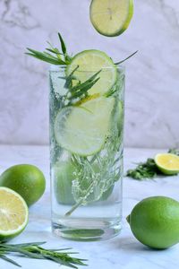 Green fruits in glass