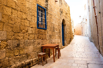 Alley amidst buildings in town