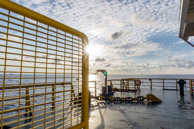 Morning scenery on a construction barge with anchor chain in the background